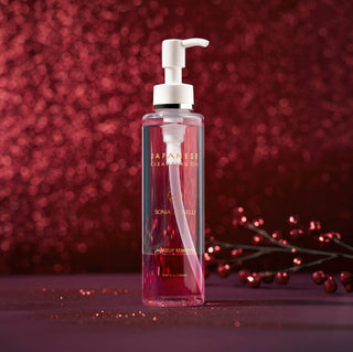 Japanese Cleansing Oil on Red Holiday Background