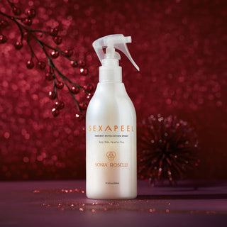 Sexapeel Spray for smoother skin texture is displayed against a festive, sparkling red backdrop.