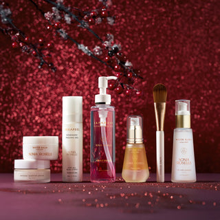 The Ultimate Skincare Set on Red Holiday Background